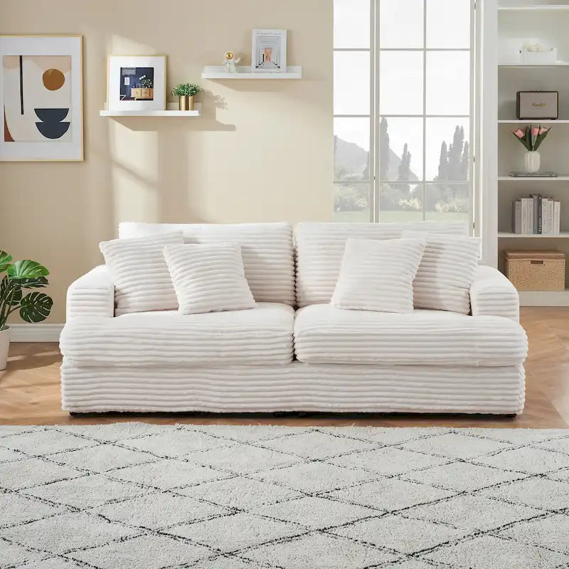 Canapé 3 places en velours côtelé de 201 cm avec 4 coussins de décoration et coussin à ressorts – Blanc