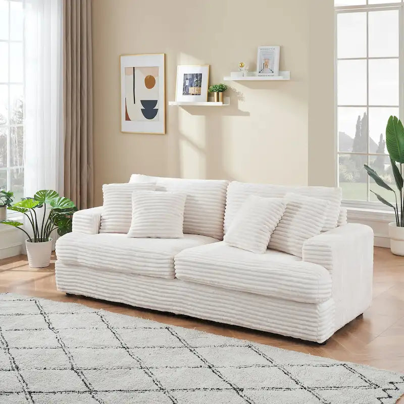 Canapé 3 places en velours côtelé de 201 cm avec 4 coussins de décoration et coussin à ressorts – Blanc