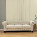 Canapé chesterfield 3 places en velours beige