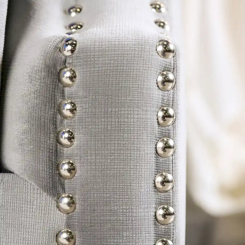 Canapé à accoudoirs tuxedo et dossier capitonné, style transitionnel
