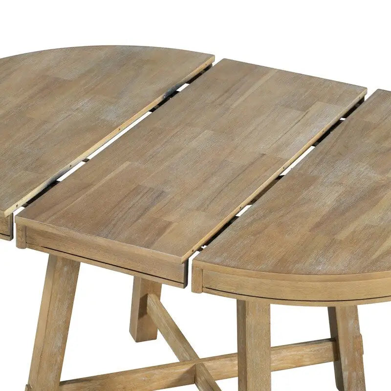 Table à manger ronde extensible avec piètement en X et rallonge intégrée